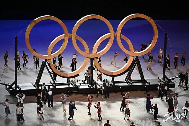 همه چیز درباره مراسم افتتاحیه المپیک ۲۰۲۰/ از حضور پرتعداد آمریکایی ها تا ورزشکار تونگایی که برهنه به ورزشگاه آمد/ کاروان ورزشی ایران با همان لباس قبلی رژه رفت/ عکس و ویدئو